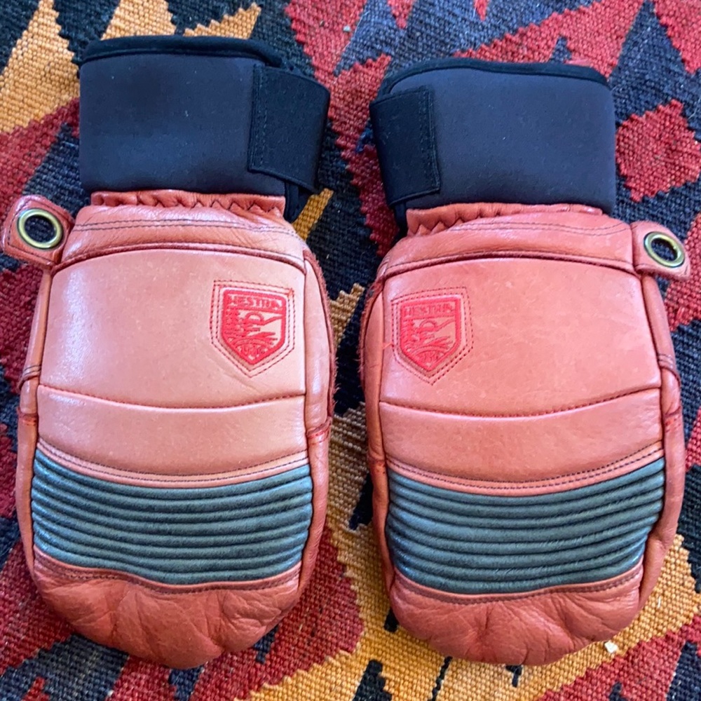 Red leather Hestra gloves.